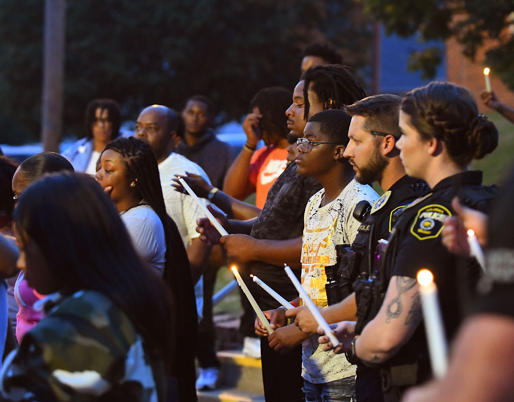 Members of the community gather for Nadria Wright's vigil